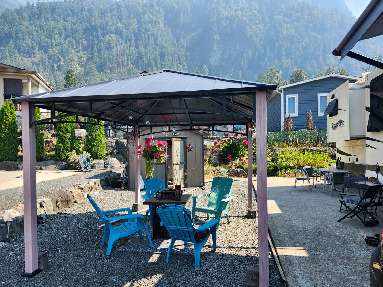 Covered outdoor pavilion with mountain backdrop